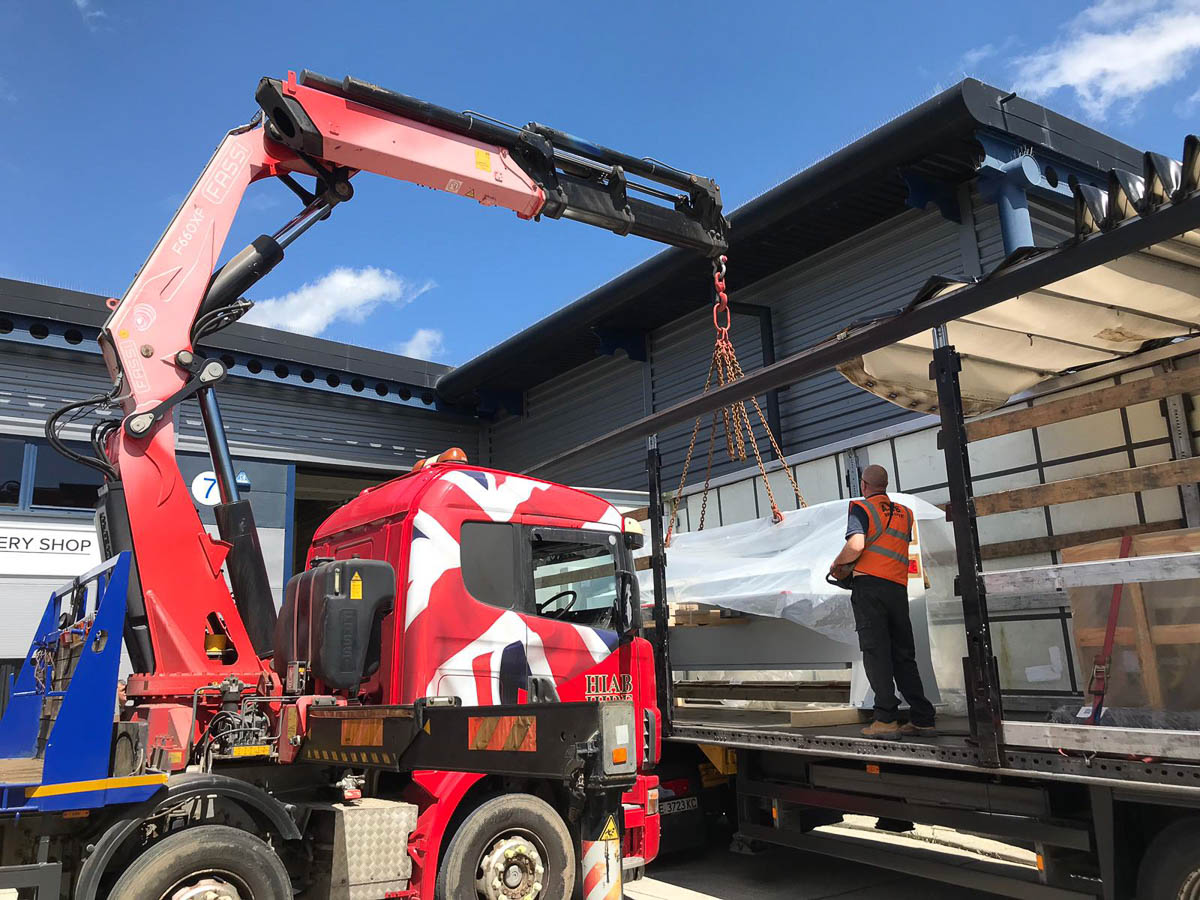 Loading an artic for delivery to France with crane truck