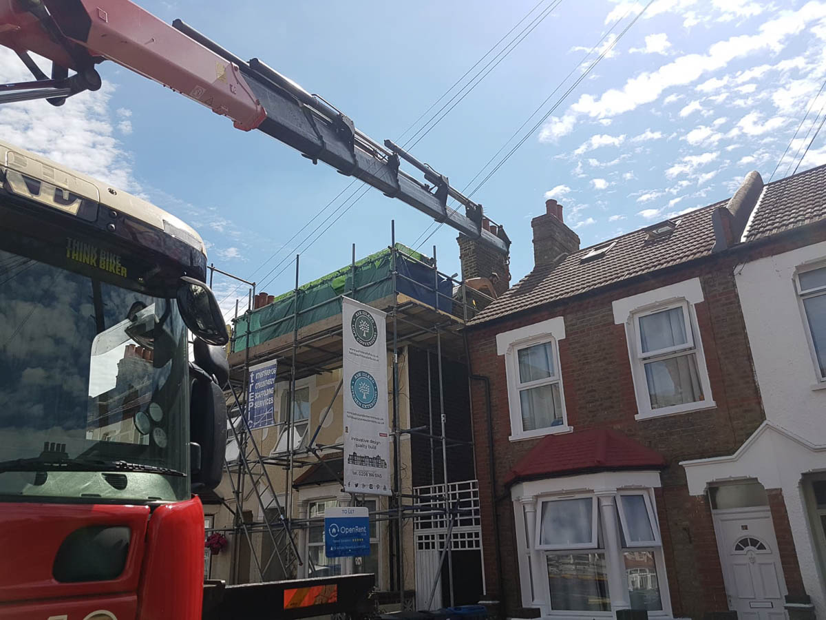 Steel RSJ in central London lifting to roof level